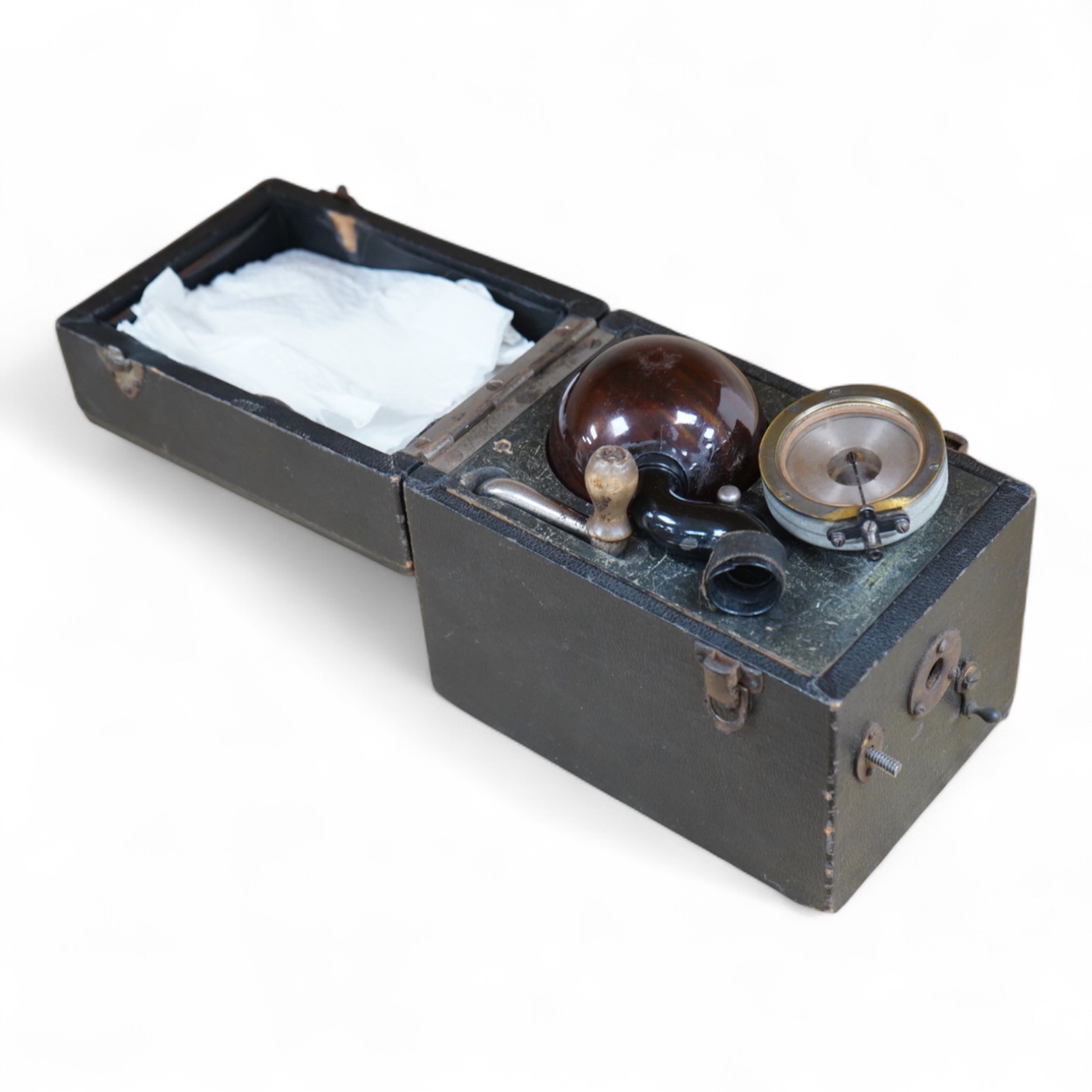 A late 19th century miniature portable gramophone, with a celluloid speaker, possibly Kammer & Reinhardt, 11 x 16 x 14.5cm